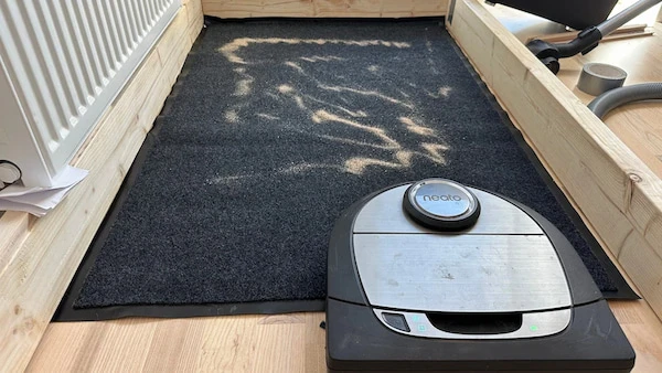 Het tapijt voordat de test begon